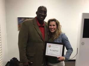 Ron Harris presenting program completion certificate