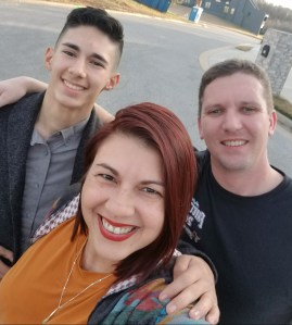 Monica, Tyler, and Bayn a family that has served with and been helped by A Level Up